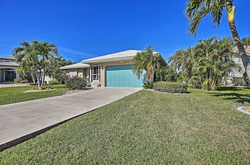 Photo 24 - Canal Waterfront Home With Private Pool & Dock