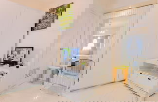 Foto 3 - Homey And Big Studio Apartment At The Wave Kuningan