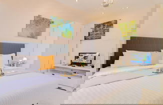Foto 2 - Homey And Big Studio Apartment At The Wave Kuningan