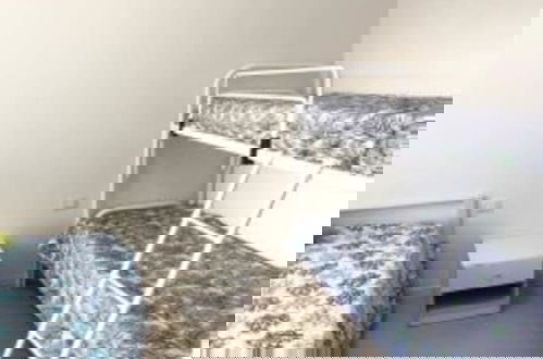 Foto 3 - Minimalist Apartment in a Quiet Area - Beahost