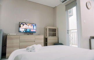 Photo 2 - Nice And Modern Studio Apartment B Residence