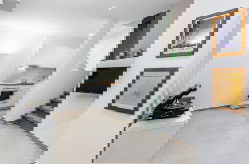 Foto 5 - Modern Macha Apartment