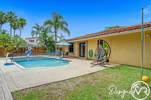Photo 34 - Stunning Waterfront 3BR with Heated POOL