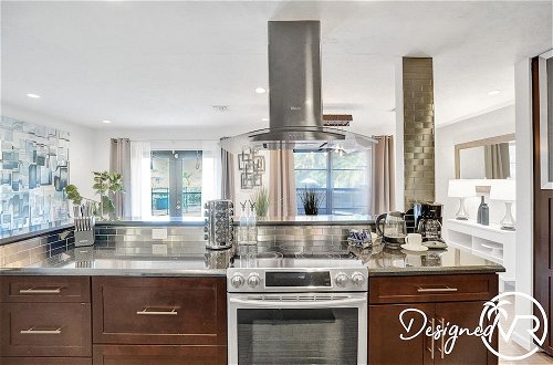Photo 12 - Stunning Waterfront 3BR with Heated POOL