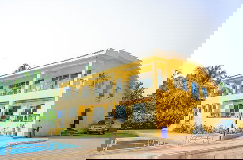 Foto 1 - Alaya Stays Veera Marina 1BHK with Pool