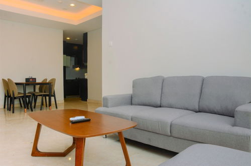 Photo 15 - Comfy and Spacious 2BR The Masterpiece Epicentrum Apartment By Travelio