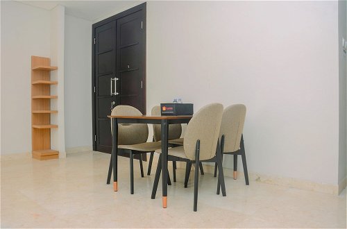 Photo 9 - Comfy and Spacious 2BR The Masterpiece Epicentrum Apartment By Travelio