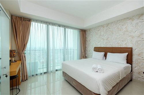 Photo 1 - Nice And Cozy Studio Apartment At Nine Residence