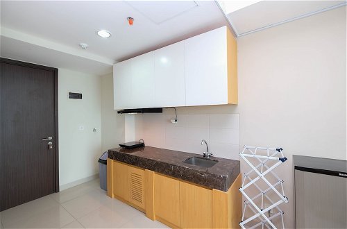 Photo 11 - Nice And Cozy Studio Apartment At Nine Residence