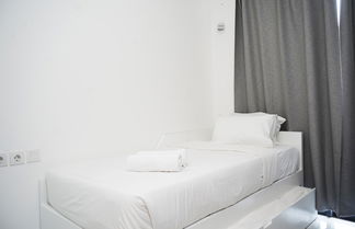 Photo 2 - Nice And Restful Studio Sky House Bsd Apartment