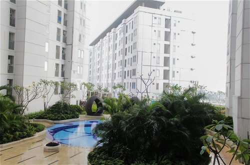 Foto 16 - Comfortable Fully Furnished 2BR Bassura City Apartment