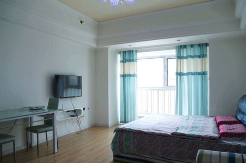 Foto 3 - Harbin Rose Apartment