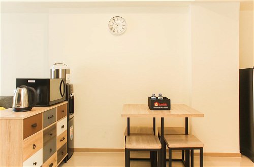 Photo 9 - Comfortable 2Br With Study Room At Meikarta Apartment
