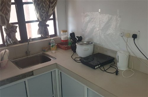 Foto 8 - Mri Homestay Sg Buloh - Studio Unit With Chargeable Private Pool