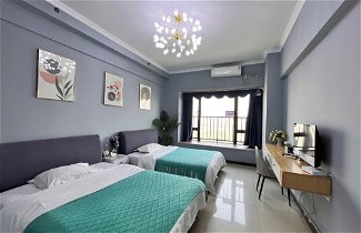 Foto 3 - Yi Long International Apartment