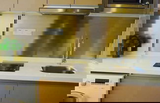 Foto 16 - Yuwa Serviced ApartHotel