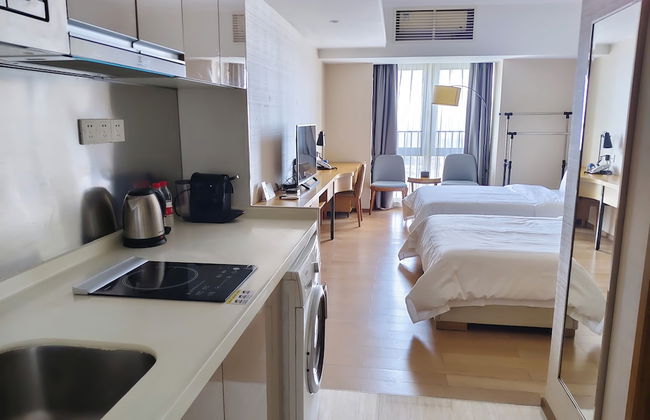 Yuwa Serviced ApartHotel - Foto 1
