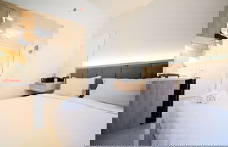 Foto 1 - New And Modern Studio At Citraland Vittorio Apartment