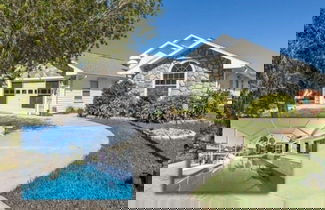 Photo 1 - Peaceful Waterfront Pool Home 3 Bedroom Home by RedAwning