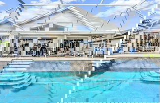 Photo 1 - Peaceful Waterfront Pool Home 3 Bedroom Home by RedAwning