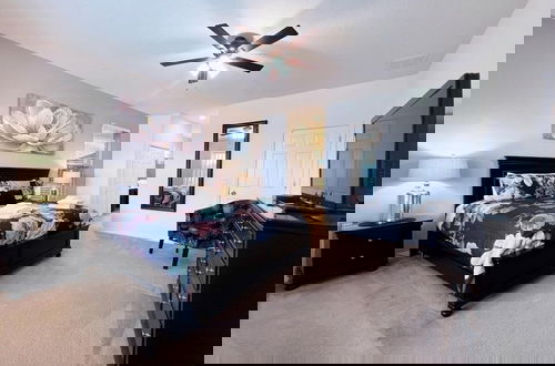 Photo 2 - Cozy Family Friendly Pool Home With Game Room-227y 5 Bedroom Home by RedAwning