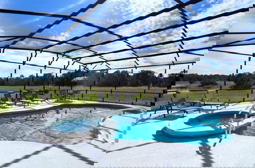 Photo 29 - Cozy Family Friendly Pool Home With Game Room-227y 5 Bedroom Home by RedAwning