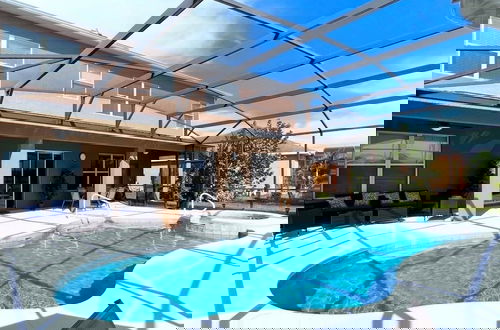 Photo 26 - Cozy Family Friendly Pool Home With Game Room-227y 5 Bedroom Home by RedAwning