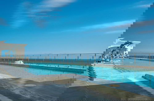Photo 2 - Sea it All Infinity Pool Ocean Views Steps From the Beach -- a Great Getaway