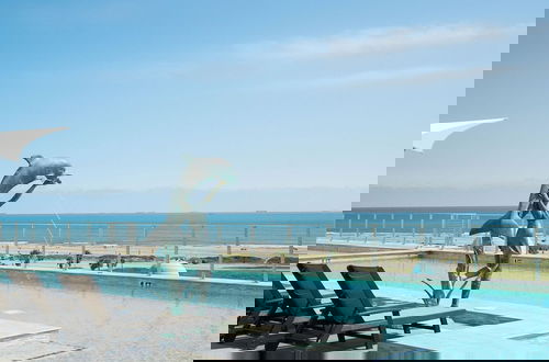 Photo 1 - Sea it All Infinity Pool Ocean Views Steps From the Beach -- a Great Getaway