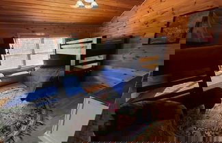 Foto 3 - Majestic Springs Lodge 3 Bedroom Cabin by RedAwning