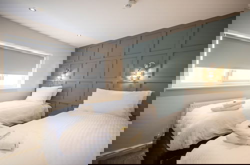 Foto 5 - The Stamford Apartment