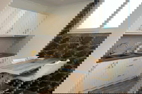 Foto 42 - Milesian Suites