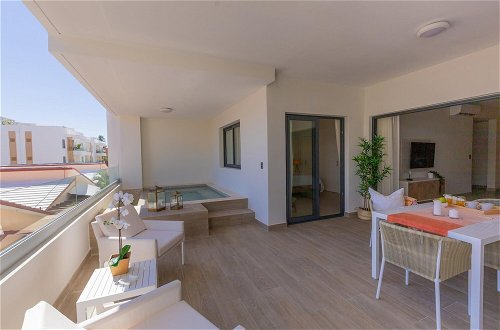 Photo 3 - Gorgeous Apartment With Private Picuzzi Steps From the Beach B3
