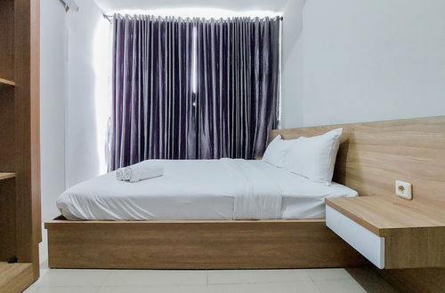 Photo 2 - Restful And Modern 2Br Majestic Point Serpong Apartment