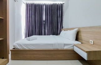 Photo 2 - Restful And Modern 2Br Majestic Point Serpong Apartment