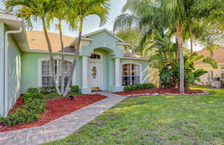 Photo 1 - Inviting Jensen Beach Home w/ Screened-in Patio