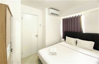Photo 2 - Full Furnished And Homey 2Br Bassura City Apartment Near Mall