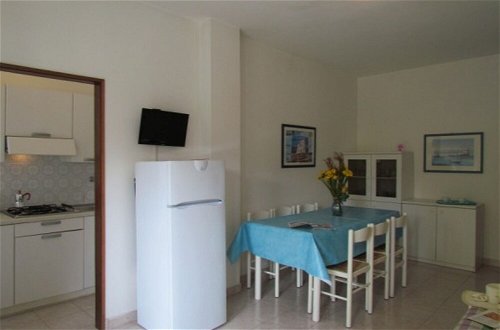 Foto 6 - welcoming and Furnished Apartment