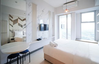 Foto 2 - Comfy Studio (No Kitchen) Apartment At Benson Supermall Mansion