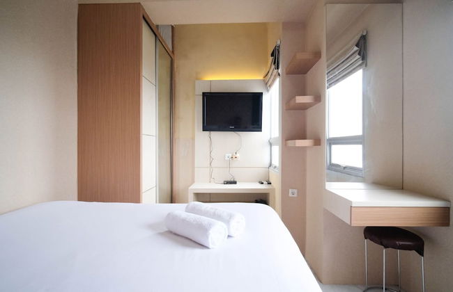 Homey And Tidy 2Br At Puri Mas Apartment - Photo 1