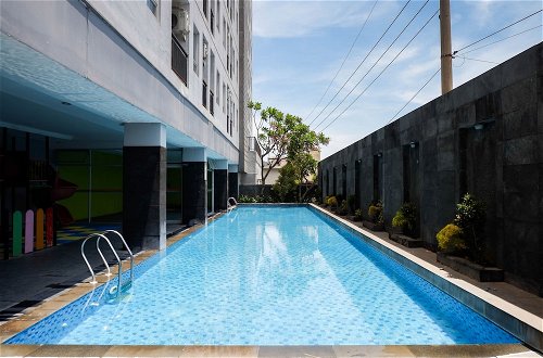 Photo 17 - Homey And Tidy 2Br At Puri Mas Apartment