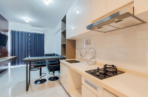 Photo 15 - Styisth 2Br At Sky House Bsd Apartment