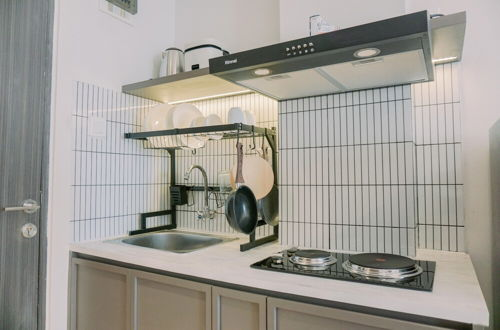 Foto 9 - Homey And Warm Studio Amazana Serpong Apartment