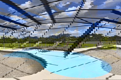 Photo 11 - Gorgeous 5bd Gm Spa Pool Hm Watersong-318ys 5 Bedroom Home by RedAwning