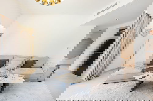 Foto 16 - Exclusive 2BR Downtown Apt w Burj Khalifa Views