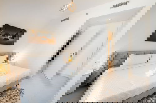 Foto 25 - Exclusive 2BR Downtown Apt w Burj Khalifa Views