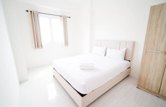 Photo 1 - Best Choice And Tidy 2Br At Puncak Dharmahusada Apartment