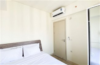 Foto 1 - Homey And Minimalist 2Br At Meikarta Apartment