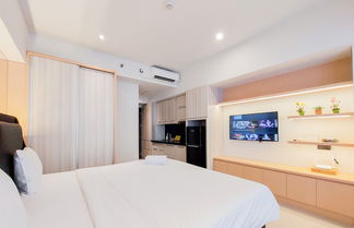 Photo 3 - Fancy And Nice Studio Apartment Carstensz Residence