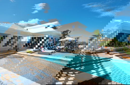 Foto 19 - Touch Of Class Cottage: Beachfront Oasis